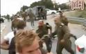 Αξιωματικός χτυπά ακτιβιστή ( Video )