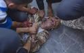 Συρία - Φωτογραφίες φρίκης με αποκεφαλισμούς ανθρώπων...!!!