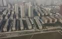 Κίνα: Έκτισαν κατά λάθος πολυκατοικία στη μέση ενός αυτοκινητόδρομου! (φωτό) - Φωτογραφία 4