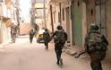 Τουλάχιστον 16 στρατιώτες σκοτώθηκαν από επίθεση και μάχες σε προάστιο της Δαμασκού
