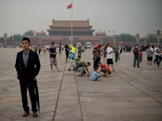 Κίνα: Ενότητα και δράση ζητεί ο Τύπος - Φωτογραφία 1