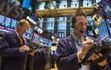 Μικτές τάσεις στην Wall Street, νέο ρεκόρ για τον Dow Jones