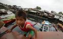 Περισσότεροι από 1200 νεκροί από τον τυφώνα που σαρώνει τις Φιλιππίνες - Φωτογραφία 6