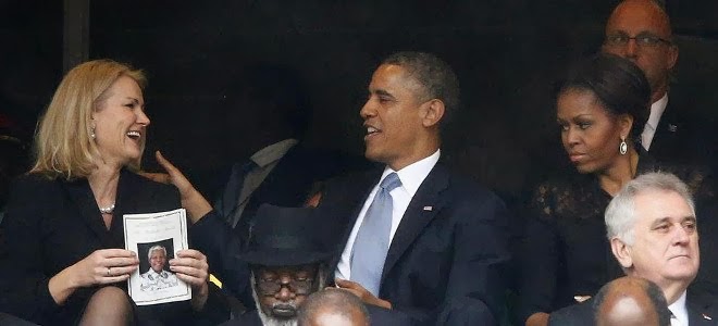 Ο Ομπάμα φλερτάρει και η Μισέλ τον αγριοκοιτάζει - To βλέμμα που σκοτώνει - Φωτογραφία 1