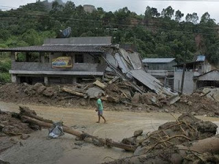 Βραζιλία: Δεκάδες νεκροί από ισχυρές βροχοπτώσεις - Φωτογραφία 1