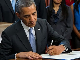 Ο Ομπάμα έβαλε την υπογραφή του στις περικοπές δαπανών - Φωτογραφία 1