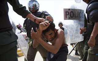 Καμπότζη: Πυρά της αστυνομίας κατά διαδηλωτών εργατών - Φωτογραφία 1
