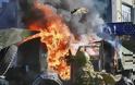 Φωτογραφίες από τις αιματηρές συμπλοκές στο Κίεβο που κόβουν την ανάσα - Φωτογραφία 11