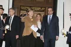 Η Μέρκελ έφαγε κατσικάκι στη λαδόκολλα και έφυγε...