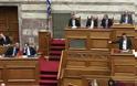 Αντιπαράθεση με φόντο την Μέρκελ