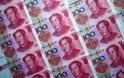 Κίνα: Σε χαμηλό 14 μηνών το γουάν
