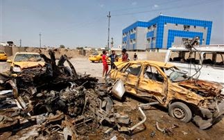 19 νεκροί και 50 τραυματίες από επιθέσεις με παγιδευμένα οχήματα στη Βαγδάτη - Φωτογραφία 1