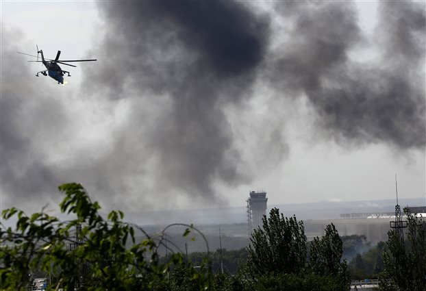 49 στρατιώτες νεκροί από κατάρριψη ουκρανικού αεροσκάφους από φιλορώσους αυτονομιστές - Φωτογραφία 1