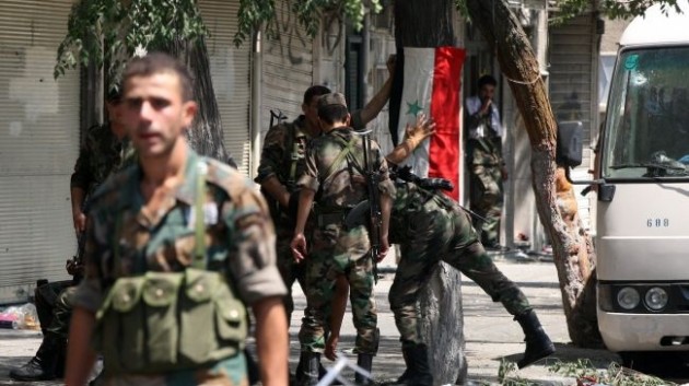 Σφοδρές μάχες στη Συρία ανάμεσα στον στρατό και τους τζιχαντιστές - Φωτογραφία 1