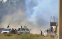 Πυρά εναντίον οχηματοπομπής με Βρετανούς στη Λιβύη - Φωτογραφία 1