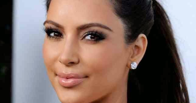 Δείτε την Kim Kardashian με μαγιό, χωρίς ρετούς! [photos] - Φωτογραφία 1