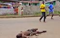 ΣΟΚ! ΠΕΤΟΥΝ τα άψυχα κορμιά των θυμάτων του ΕΜΠΟΛΑ στους δρόμους της Λιβερίας - Φωτογραφία 2