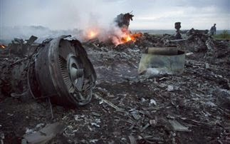 Στη Μαλαισία τρεις σοροί του Boeing που κατερρίφθη στην Ουκρανία - Φωτογραφία 1