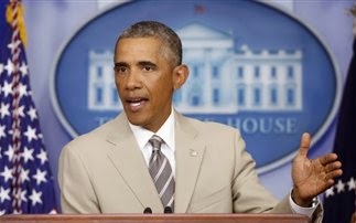Έκλεψε την παράσταση το σακάκι του Ομπάμα - Φωτογραφία 1