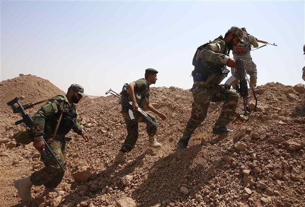 Μέρκελ: Προς το συμφέρον της Δύσης ο εξοπλισμός των Κούρδων - Φωτογραφία 1