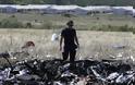 Επίσημο πόρισμα για το μοιραίο MH17 των Μαλαισιανών αερογραμμών: Χτυπήθηκε από ιπτάμενα αντικείμενα πάνω από την Ουκρανία - Φωτογραφία 2