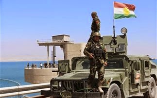 Κούρδοι μαχητές φθάνουν στη Συρία για να πολεμήσουν τους τζιχαντιστές - Φωτογραφία 1