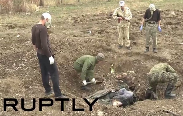 Bρέθηκε και τέταρτος ομαδικός τάφος έξω από το Ντονιέτσκ - Διεθνής καταδίκη για τη βάναυση σφαγή - Φωτογραφία 1