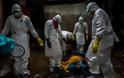 Φωτογραφίες γροθιά στο στομάχι κατέγραψε με το φακό του φωτορεπόρτερ  στη Λιβερία που δοκιμάζεται από το ιό Έμπολα (Pics) - Φωτογραφία 10