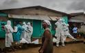 Φωτογραφίες γροθιά στο στομάχι κατέγραψε με το φακό του φωτορεπόρτερ  στη Λιβερία που δοκιμάζεται από το ιό Έμπολα (Pics) - Φωτογραφία 12