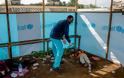Φωτογραφίες γροθιά στο στομάχι κατέγραψε με το φακό του φωτορεπόρτερ  στη Λιβερία που δοκιμάζεται από το ιό Έμπολα (Pics) - Φωτογραφία 17