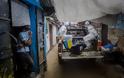 Φωτογραφίες γροθιά στο στομάχι κατέγραψε με το φακό του φωτορεπόρτερ  στη Λιβερία που δοκιμάζεται από το ιό Έμπολα (Pics) - Φωτογραφία 2