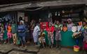 Φωτογραφίες γροθιά στο στομάχι κατέγραψε με το φακό του φωτορεπόρτερ  στη Λιβερία που δοκιμάζεται από το ιό Έμπολα (Pics) - Φωτογραφία 3