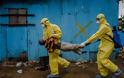 Φωτογραφίες γροθιά στο στομάχι κατέγραψε με το φακό του φωτορεπόρτερ  στη Λιβερία που δοκιμάζεται από το ιό Έμπολα (Pics) - Φωτογραφία 9