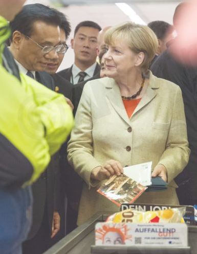 Η Μέρκελ έσυρε τον Κινέζο Πρωθυπουργό στο σούπερ μάρκετ - Φωτογραφία 6