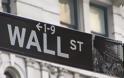 Wall Street: Hπιες απώλειες με το βλέμμα στη Fed