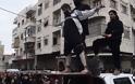 Εικόνες φρίκης από τη Συρία: Τζιχαντιστές σταυρώνουν και ακρωτηριάζουν σε δημόσια θέα - Φωτογραφία 2
