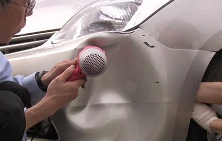 Επισκευάζοντας ένα βούλιαγμα στο αυτοκίνητο με το πιστολάκι για τα μαλλιά [Video] - Φωτογραφία 1