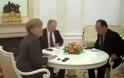 Μέρκελ και Πούτιν, δυο ξένοι στο ίδιο τραπέζι...[video]