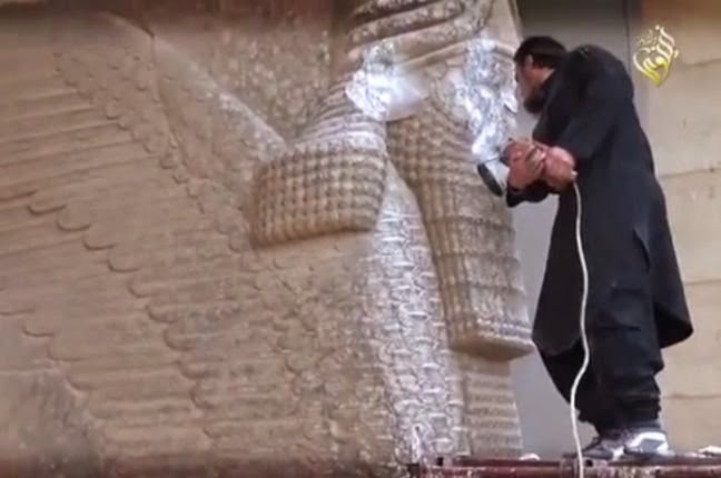 Γλυπτά χιλιάδων ετών κατέστρεψε το Ισλαμικό Κράτος - Φωτογραφία 1