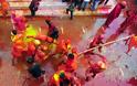 Holi Festival: Η εντυπωσιακή γιορτή στην Ινδία που γεμίζει τις πόλεις με χρώμα [photos] - Φωτογραφία 10