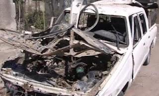 Κατεστραμμένα αυτοκίνητα σε κεντρική οδική αρτηρία στη Δαμασκό - Φωτογραφία 1