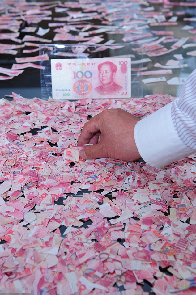 ΦΩΤΟ: Εκδικήθηκε τον άντρα της κομματιάζοντας τα 50.000 γουάν του - Φωτογραφία 2