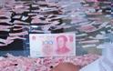 ΦΩΤΟ: Εκδικήθηκε τον άντρα της κομματιάζοντας τα 50.000 γουάν του - Φωτογραφία 2