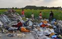 Eννιά μήνες μετά - Συγκλονιστικές εικόνες από το σημείο συντριβής του αεροσκάφους της Malaysia στην Ουκρανία [photos] - Φωτογραφία 2