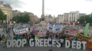 TΩΡΑ: Συγκέντρωση αλληλεγγύης προς την Ελλάδα στο Λονδίνο - Φωτογραφία 1