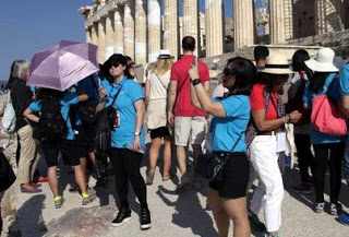 Bloomberg: Πώς η ελληνική αναταραχή ενίσχυσε τον τουρισμό Ισπανίας και Πορτογαλίας - Φωτογραφία 1