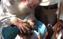 Δεν έχει χαθεί η ανθρωπία στις μέρες μας - Ομαδική βάπτιση 17 παιδιών απο την Κιβωτό του Κόσμου στην Πωγωνιανή [photos]
