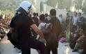 Εικόνες ντροπής από τη Μυτιλήνη - Δείτε τι έκανε αστυνομικός σε λαθρομετανάστη... [photos] - Φωτογραφία 2