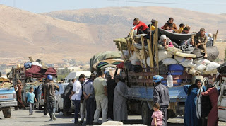 Συρία: Εκατοντάδες οικογένειες επιστρέφουν στα σπίτια τους στη Δαμασκό - Φωτογραφία 1