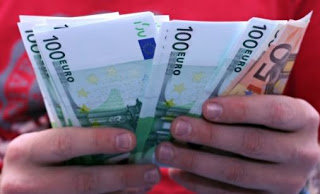 Το Βερολίνο εξετάζει πλαφόν 5.000 ευρώ στα μετρητά - Φωτογραφία 1